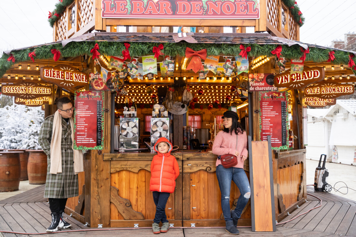 Family Photoshoot at Christmas market Tuilleries Garden Paris by Eny Therese Photography