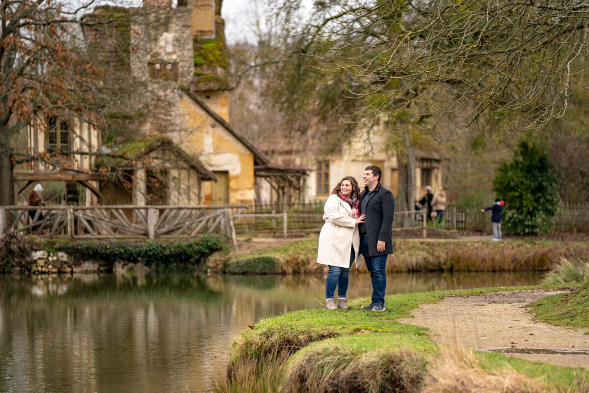 Surprise Proposal in Marie Antoinette Hamlet Versailles by Eny Therese Photography