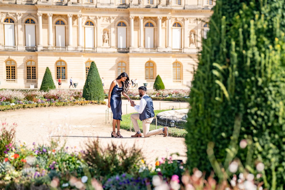 Surprise proposal at Versailles Paris by Eny Therese Photography