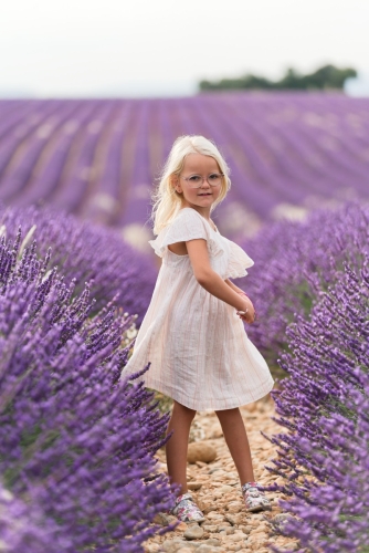 a little girl in Lavender blooming at Valensole Eny Therese